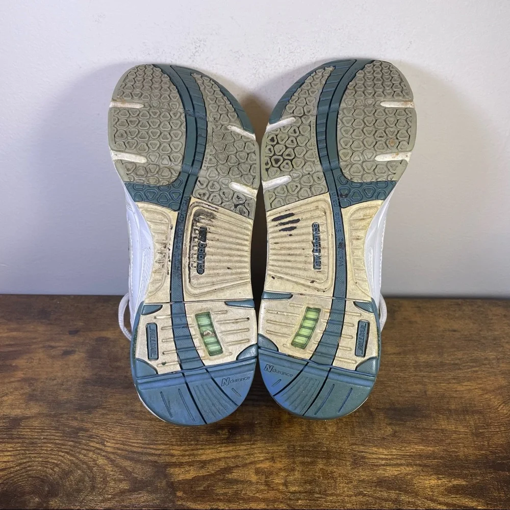 New Balance White Athletic Sneakers with Blue Accents
